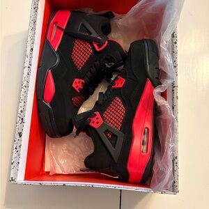 Air Jordan Retro 4. Nike Kids Black and Bright Red Sneakers